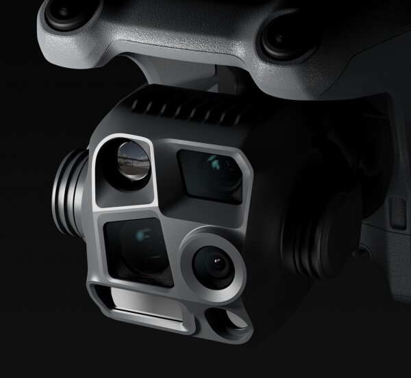 Close-up of the FANTM 4TD camera head with four lenses and laser range-finder