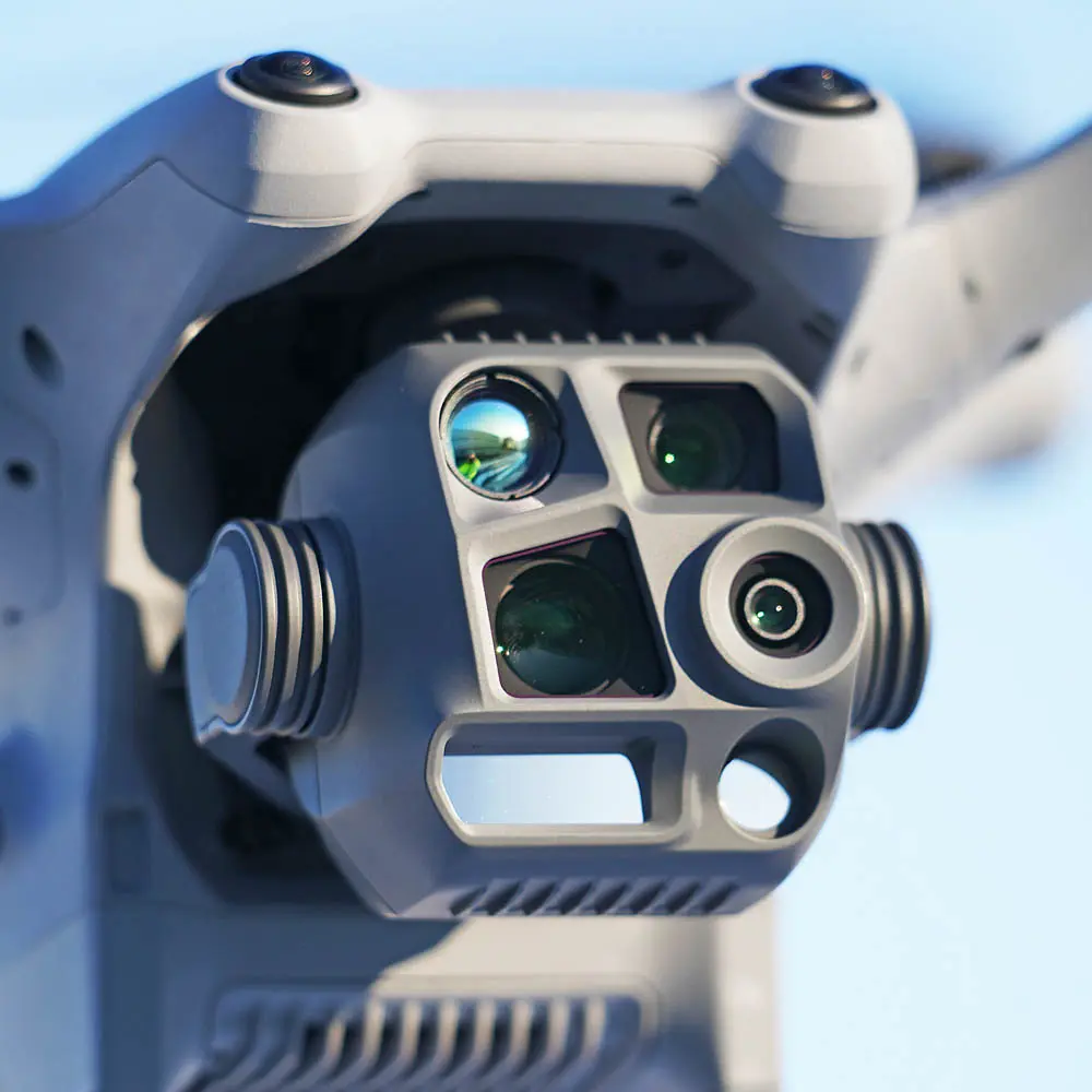 Close-up of an inspection drone sensor head with several lenses. (AI-generated image)