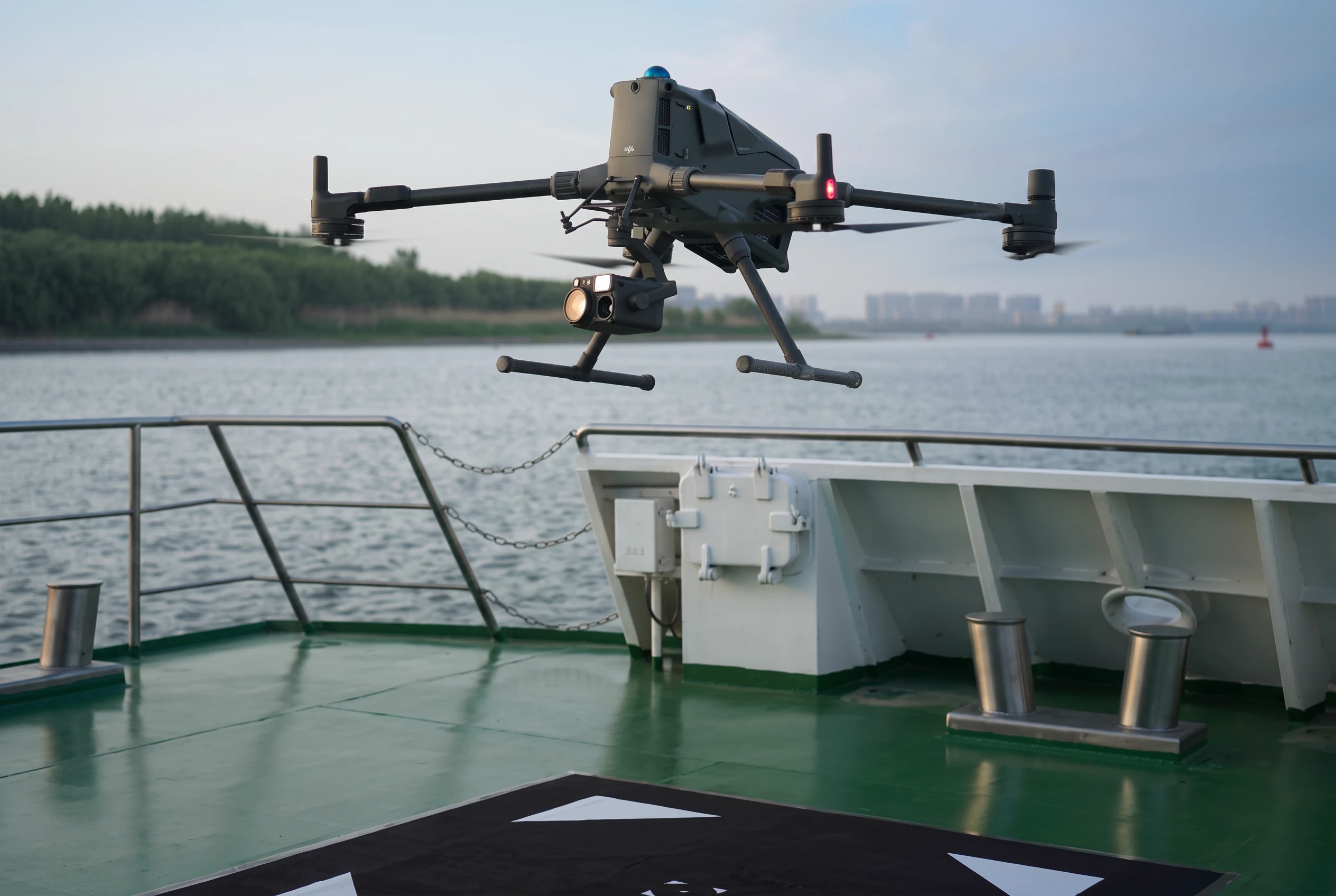 FANTM 400 lifting off from a ship deck above the water.